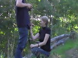 Slutty amateur chick favours a guy by sucking his dick outdoor