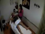 Asian masseuse rubs a guys cock