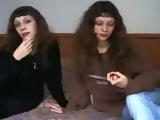 Some Russian Twins Give Show Some Business Men a Good Time