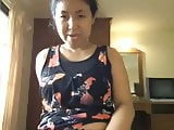 Mature Asian playing 2