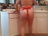 Blonde  playful around the kitchen