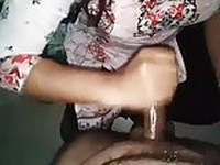 Girl friend giving Handjob to her lover at home