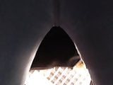 Under the buttocks of a beautiful woman in jeans