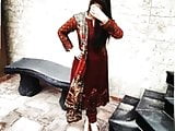 Noor Fatima of FUUAST uni ISB strips for her clas mate Naved