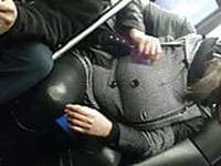 Big freaky eyed sista hiding huge tits underneath coat