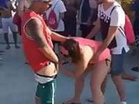 Public blowjob at a music festival.