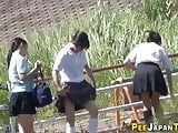 Watched asian teens in uniform pee