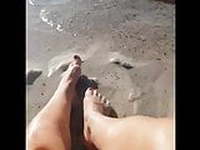 Feet by the sea