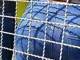 A round ass in blue jeans