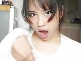 young Asian teen jerks you off in pov